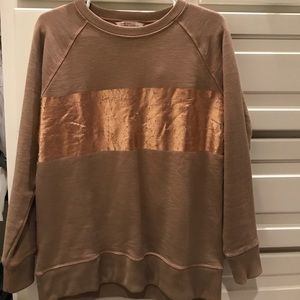Tan sweatshirt with weathered bronze stripe